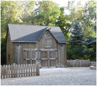 The owner built this new Ashokan Barn in Utah and treated the wood with weathering oil to make it look aged. A neighbor liked it so much that he is building his own. Inexpensive stock plans are available at BackroadHome.net 